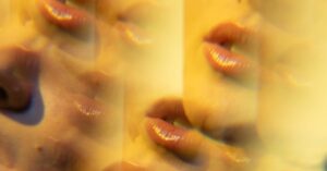 Artistic double exposure of human faces creating an abstract illusion.